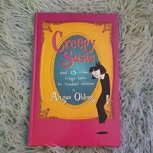 Creepy Susie by Angus Oblong